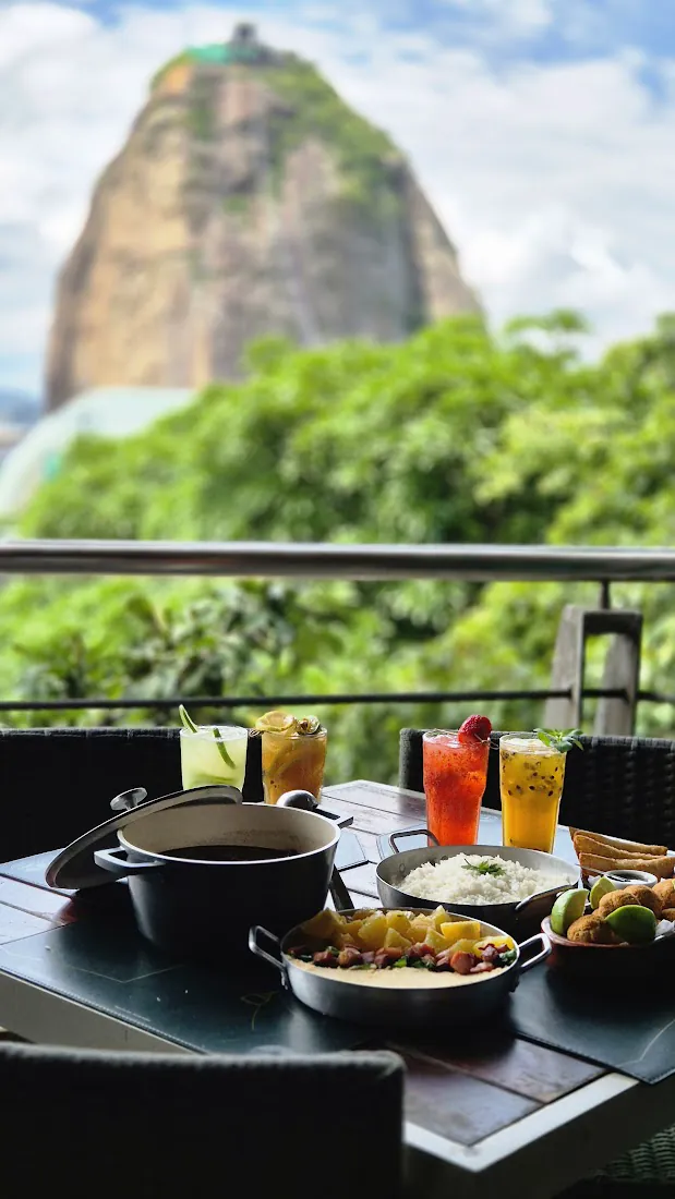 award-winning feijoada from Academia da Cachaça with sun-dried beef and tropical drinks on the terrace — Embaixada Carioca, Urca Hill